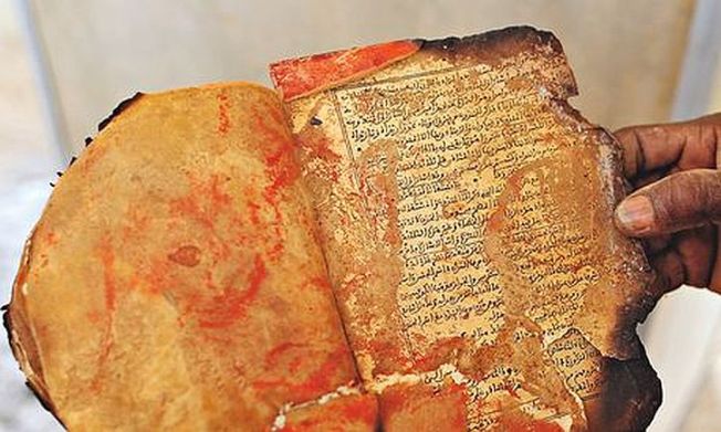 A damaged Timbuktu manuscript saved during the rescue operation.